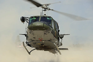 An Agusta Bell AB 212 of the Italian Air Force landing An Agusta Bell AB 212 of the Italian Air Force landing