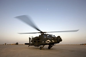 An AH-64D Apache Longbow Block III gets ready for takeoff An AH-64D Apache Longbow Block III gets ready for takeoff
