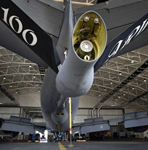 Airman hand-washes the centerline on the underbelly of a KC-135 Stratotanker Airman hand-washes the centerline on the underbelly of a KC-135 Stratotanker