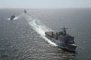 The amphibious dock landing ship USS Carter Hall breaks away following a replenishment The amphibious dock landing ship USS Carter Hall breaks away following a replenishment