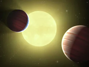 Artists concept illustrating the two Saturn-sized planets discovered by the Kepler Artists concept illustrating the two Saturn-sized planets discovered by the Kepler
