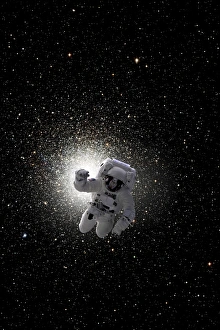 Astronaut floating in deep space with large cluster galaxy in background Astronaut floating in deep space with large cluster galaxy in background