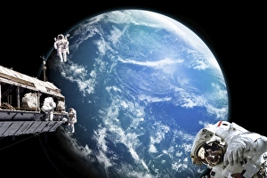 Astronauts perform work on a space station while orbiting above a water covered planet Astronauts perform work on a space station while orbiting above a water covered planet