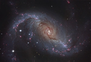 Barred spiral galaxy NGC 1672 in the constellation Dorado Barred spiral galaxy NGC 1672 in the constellation Dorado