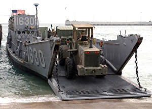 Beach Master Unit loads cargo aboard a Landing Craft Utility Beach Master Unit loads cargo aboard a Landing Craft Utility