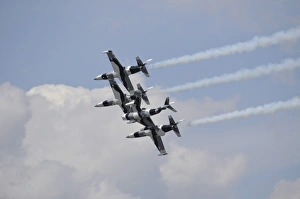 The Black Diamond Jet Team fly in diamond formation The Black Diamond Jet Team fly in diamond formation