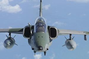 A Brazilian Air Force AMX-T (A-1B) fighter-bomber in flight A Brazilian Air Force AMX-T (A-1B) fighter-bomber in flight