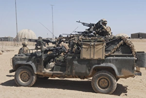 British paratroopers on patrol in their Land Rover British paratroopers on patrol in their Land Rover