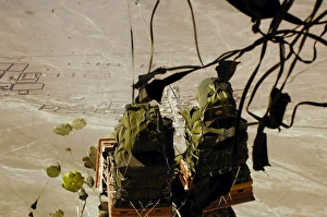 Bundles of humanitarian supplies are dropped from a C-17 Globemaster III Bundles of humanitarian supplies are dropped from a C-17 Globemaster III