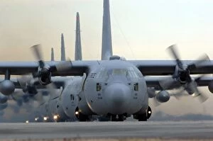 Images Dated 6th January 2006: C-130 Hercules aircraft taxi out for a mission during a six-ship sortie