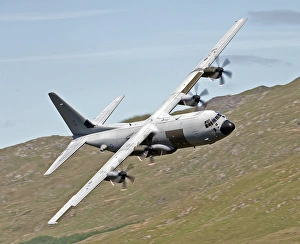 A C-130J Super Hercules low flying over North Wales on a training flight A C-130J Super Hercules low flying over North Wales on a training flight