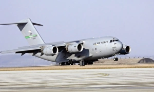 A C-17 Globemaster III lands at Spangdahlem Air Base, Germany A C-17 Globemaster III lands at Spangdahlem Air Base, Germany