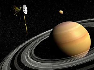 Cassini spacecraft orbiting Saturn and and its moon Titan Cassini spacecraft orbiting Saturn and and its moon Titan