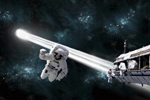 A comet passes dangerously close to astroanuts working on space station A comet passes dangerously close to astroanuts working on space station