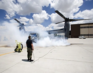 A CV-22 Osprey starts its engines at Kirtland Air Force Base A CV-22 Osprey starts its engines at Kirtland Air Force Base