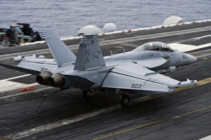 An EA-18G Growler lands on the flight deck of USS Carl Vinson An EA-18G Growler lands on the flight deck of USS Carl Vinson