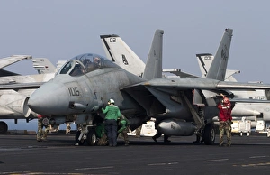 An F-14D Tomcat on the flight deck of USS Theodore Roosevelt An F-14D Tomcat on the flight deck of USS Theodore Roosevelt