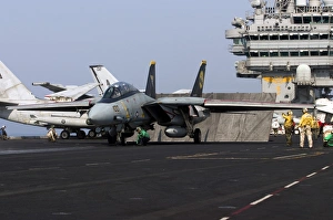 An F-14D Tomcat in launch position on the flight deck of USS Theodore Roosevelt An F-14D Tomcat in launch position on the flight deck of USS Theodore Roosevelt