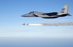 An F-15 Eagle fires an AIM-7 Sparrow medium range air-to-air missile An F-15 Eagle fires an AIM-7 Sparrow medium range air-to-air missile
