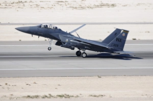 An F-15C Eagle landing on the runway at Nellis Air Force Base An F-15C Eagle landing on the runway at Nellis Air Force Base