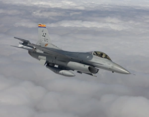 An F-16 Fighting Falcon maneuvers during a training mission An F-16 Fighting Falcon maneuvers during a training mission