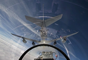An F-16 flies in the pre-contact position behind a KC-135R Stratotanker An F-16 flies in the pre-contact position behind a KC-135R Stratotanker