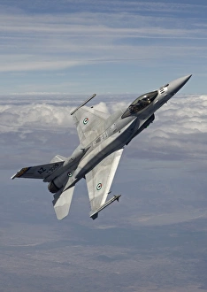 An F-16E maneuvers during a training mission over Arizona An F-16E maneuvers during a training mission over Arizona
