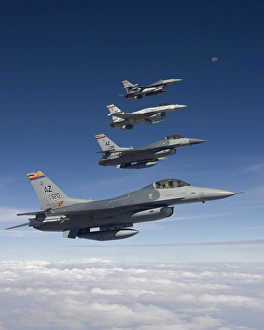 Four F-16s fly in formation during a training mission over Arizona Four F-16s fly in formation during a training mission over Arizona