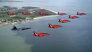 Red Arrows Prints: F-22 Raptor in Formation with the Red Arrows Print