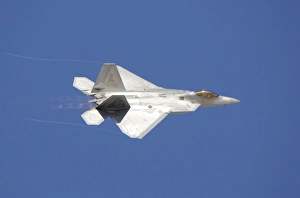An F-22 Raptor in flight over Nellis Air Force Base, Nevada An F-22 Raptor in flight over Nellis Air Force Base, Nevada