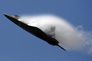 An F-22 Raptor performs during an air show An F-22 Raptor performs during an air show