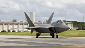 An F-22 Raptor taxis to the end of runway at Kadena Air Base, Japan An F-22 Raptor taxis to the end of runway at Kadena Air Base, Japan