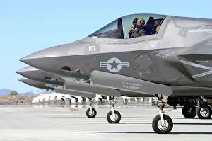 Three F-35B Lightning IIs at Marine Corps Air Station Yuma, Arizona Three F-35B Lightning IIs at Marine Corps Air Station Yuma, Arizona