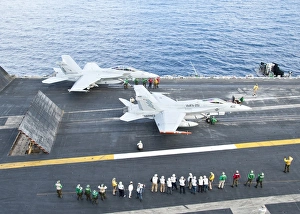 F/A-18 aircraft prepare to take off from the flight deck of USS Enterprise F/A-18 aircraft prepare to take off from the flight deck of USS Enterprise