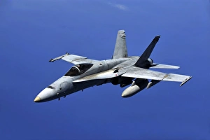 A F/A-18 Hornet flies a mission in support of Rim of the Pacific A F/A-18 Hornet flies a mission in support of Rim of the Pacific