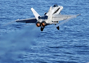 An F/A-18C Hornet taking off An F/A-18C Hornet taking off