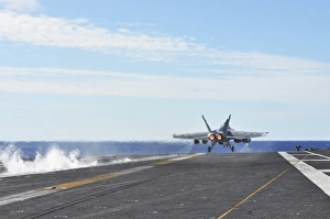 An F/A-18E Super Hornet launches from the flight deck of USS George Washington An F/A-18E Super Hornet launches from the flight deck of USS George Washington