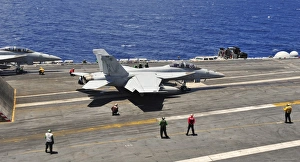 An F/A-18E Super Hornet prepares to launch from USS Carl Vinson An F/A-18E Super Hornet prepares to launch from USS Carl Vinson