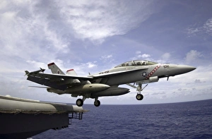 An F/A-18F Super Hornet launches from the flight deck of USS Kitty Hawk An F/A-18F Super Hornet launches from the flight deck of USS Kitty Hawk