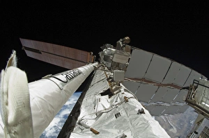 Fish-eye lens view of the Enhanced International Space Station Boom Assembly Fish-eye lens view of the Enhanced International Space Station Boom Assembly