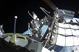 Fish-eye lens view of a portion of the International Space Station Fish-eye lens view of a portion of the International Space Station