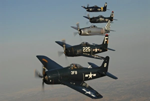 Formation of Grumman F8F Bearcats flying over Chino, California Formation of Grumman F8F Bearcats flying over Chino, California