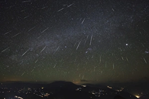 The Geminids meteor shower streaks across the clear sky above Yunnan province of China The Geminids meteor shower streaks across the clear sky above Yunnan province of China