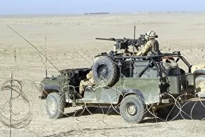 Images Dated 24th September 2006: Gurkhas patrol Afghanistan in a Land Rover