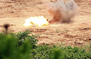 Ten half-pound blocks of TNT simultaneously detonate Ten half-pound blocks of TNT simultaneously detonate