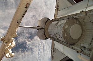 Spacecraft In Orbit Prints: The Harmony node in Space Shuttle Discoverys cargo bay