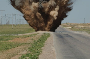 Iraq War Photos Prints: An Improvised Explosive Device destroyed by C-4 explosives