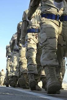 Iraqi air force recruits march in a pass in review parade during their graduation Iraqi air force recruits march in a pass in review parade during their graduation