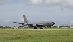 A KC-135 Stratotanker lands on the runway at Kadena Air Base, Japan A KC-135 Stratotanker lands on the runway at Kadena Air Base, Japan