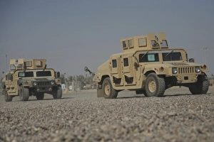 Two M1114 Humvee vehicles at Camp Taji, Iraq Two M1114 Humvee vehicles at Camp Taji, Iraq